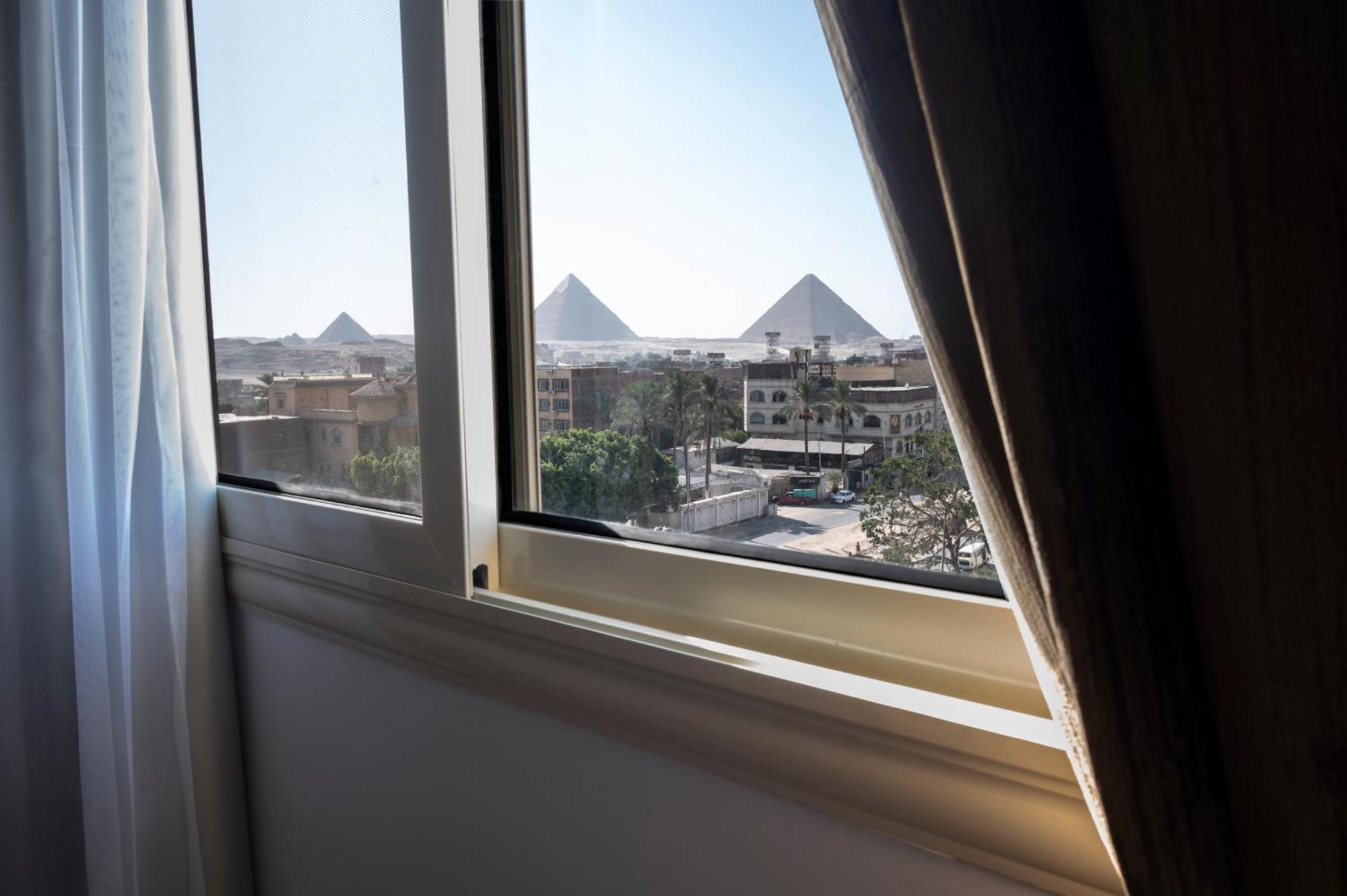 Palm Pyramids View Hotel Kafrat al Jabal Номер фото